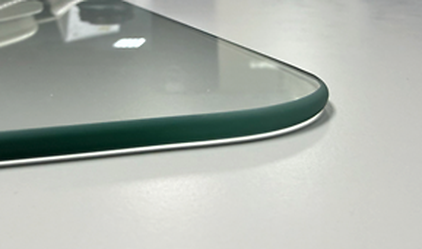 Tempered side-door glass rounded-corner detail